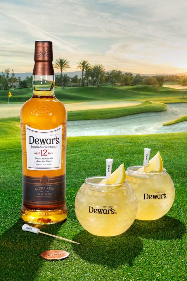 Two Dewar's Lemon Wedge cocktails on a golf driving range.